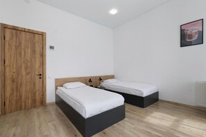 Habitación familiar, balcón, vistas a la ciudad | Spa