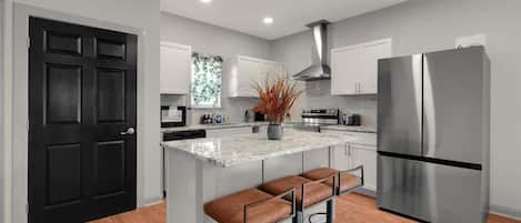 Coffee/tea maker, fridge, microwave, oven