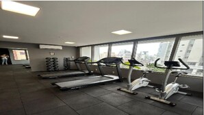 Appartement Luxe, vue ville | Salle de remise en forme