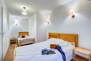 The second bedroom contains a Double bed and a Single bed.