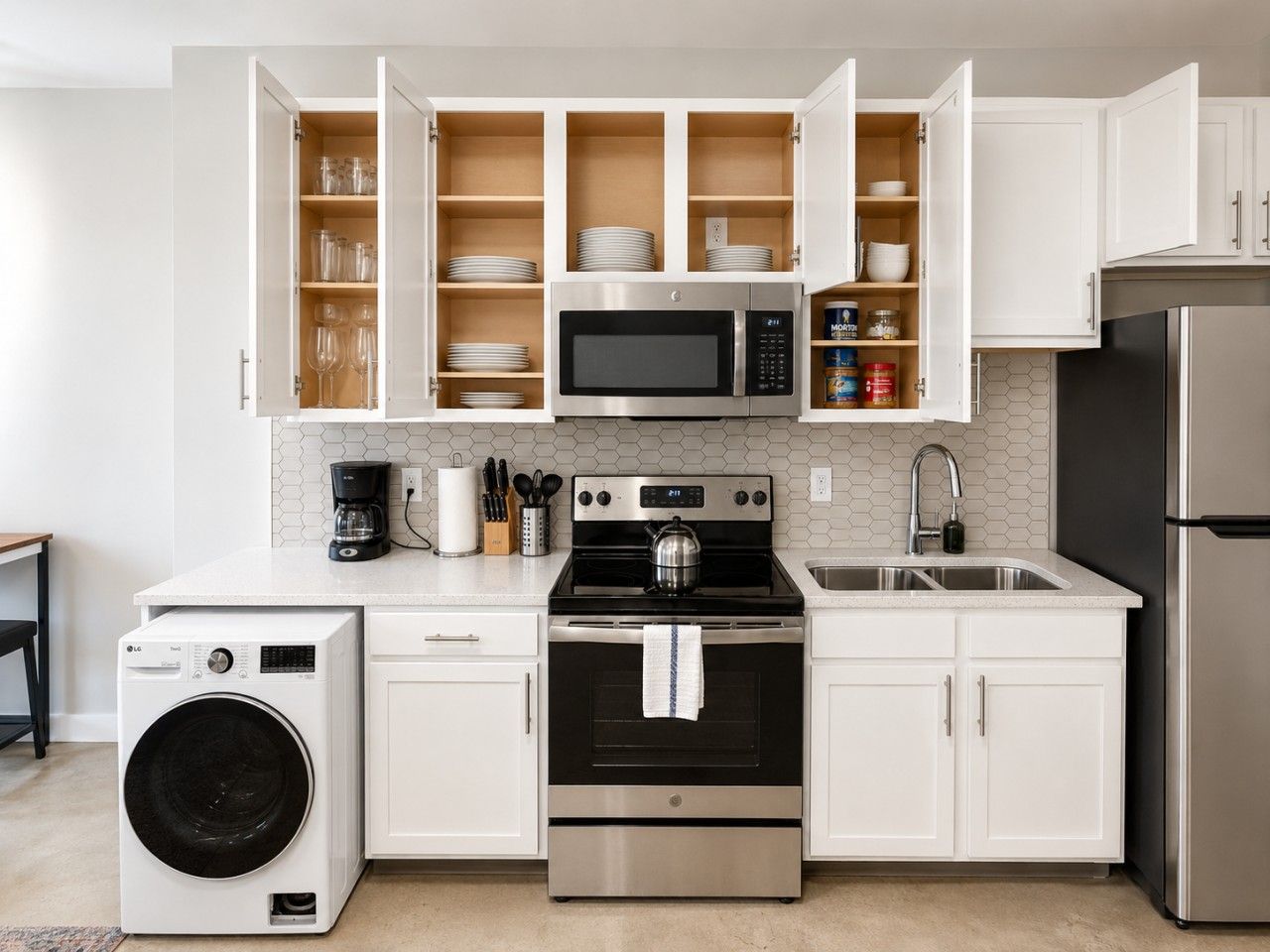 Coffee/tea maker, fridge, microwave, oven