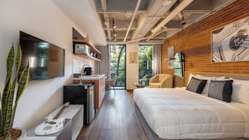 Superior Studio, 1 Double Bed, Balcony | Desk, laptop workspace, blackout drapes, iron/ironing board