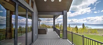 Spacious mountain home with lake views, large decks, bunk rooms, and resort amenities
