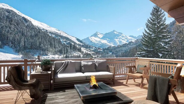 A deck with a sofa, chairs, a fire pit, and a view of snow-covered mountains. - Chalet Ouréa #102 - 6 guests - Ski-in - Ski-out (Les Allues)