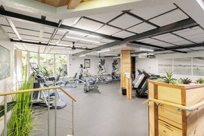 A gym with treadmills, elliptical machines, and stationary bikes. - SolMar Vista 2BR/2BA Oceanview, Heated Pools, Hot Tubs & Steps to Beach (Oceanside)