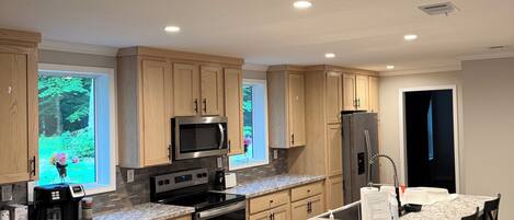 Coffee/tea maker, fridge, microwave, oven