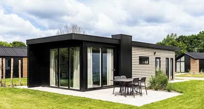 Charming 2-bedroom chalet by peaceful canals amid Dutch nature