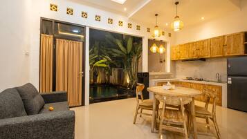 Deluxe Villa, 1 Bedroom, Non Smoking, Pool View | Living area