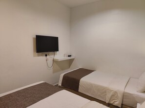 Chambre Exécutive avec lits jumeaux, 2 lits une place | Wi-Fi gratuit