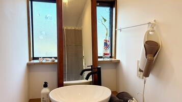 Hair dryer, towels, soap, toilet paper
