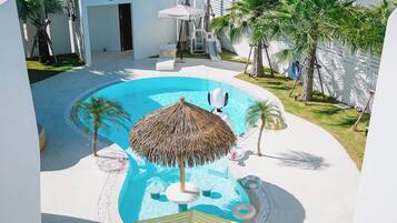Outdoor pool, pool umbrellas, pool loungers