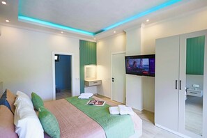 Tabla de planchar con plancha, wifi gratis y ropa de cama 