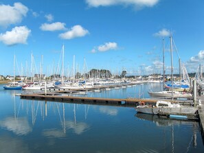 A marina with multiple sailboats docked at wooden piers. - Hotel de Ville by Interhome (Perros Guirec)