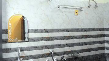 Deluxe Double Room, Garden View | Bathroom | Shower, towels, soap, shampoo