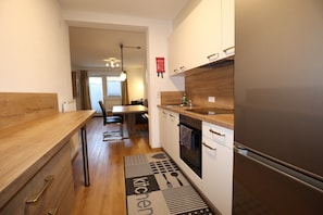 Coffee/tea maker, fridge, microwave, oven - Apartment in Strengen with mountain views (Strengen)