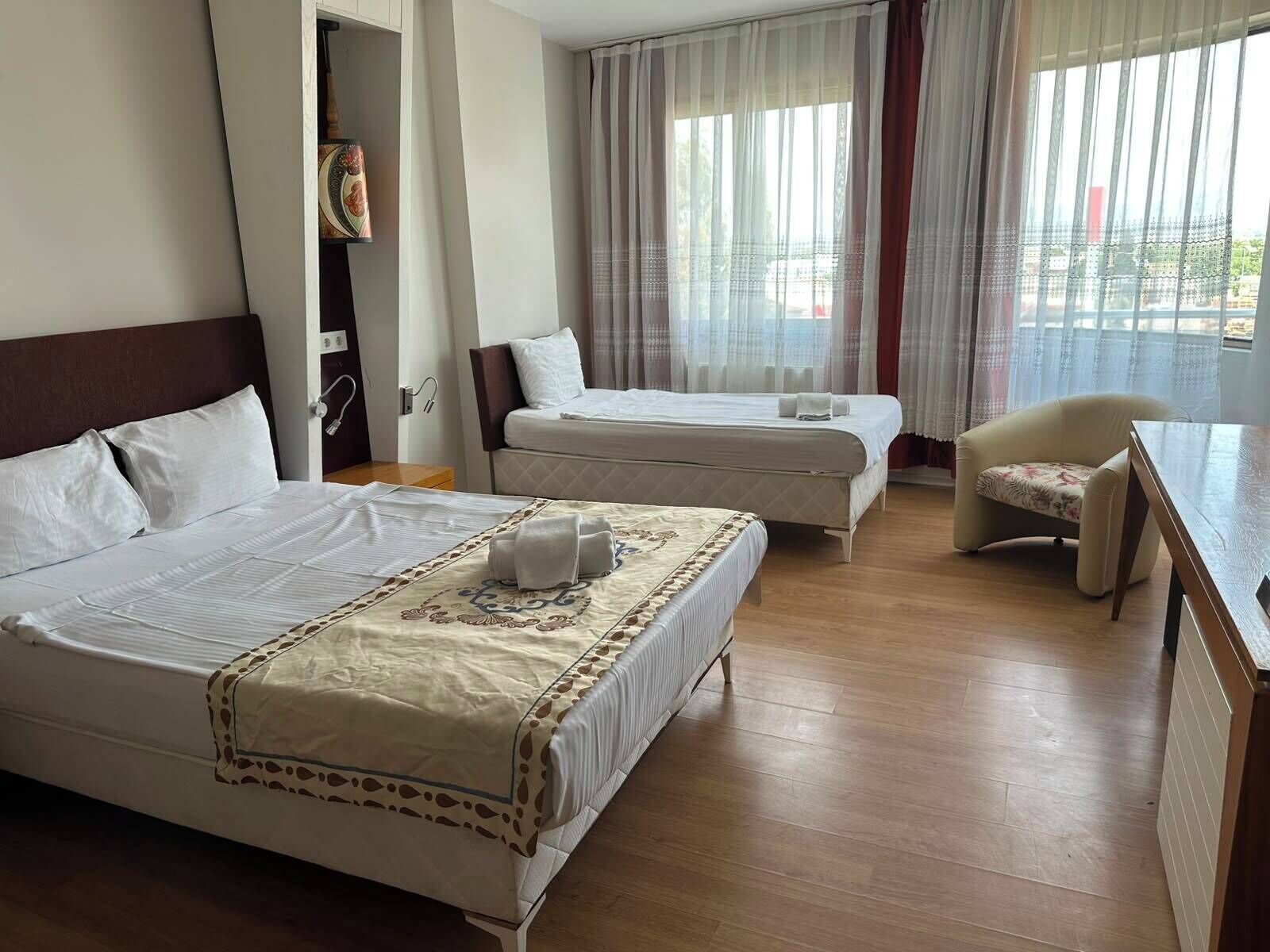 Family Triple Room, Balcony | Free WiFi