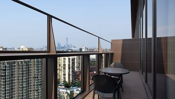 Premier Suite, 1 King Bed, City View | Premium bedding, down comforters, in-room safe, blackout drapes