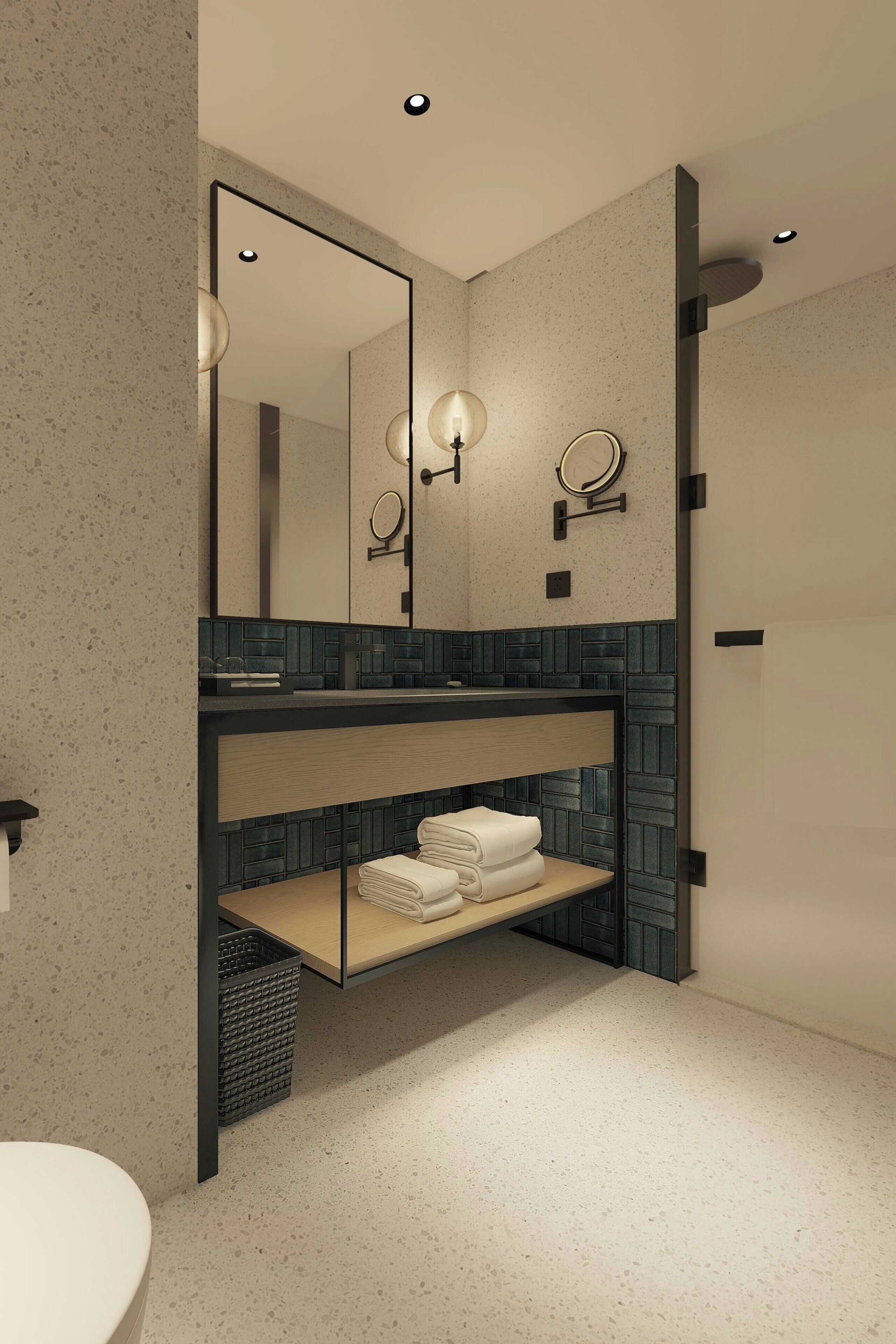 Une salle de bain moderne avec un lavabo sur pied, un miroir et un porte-serviettes.
