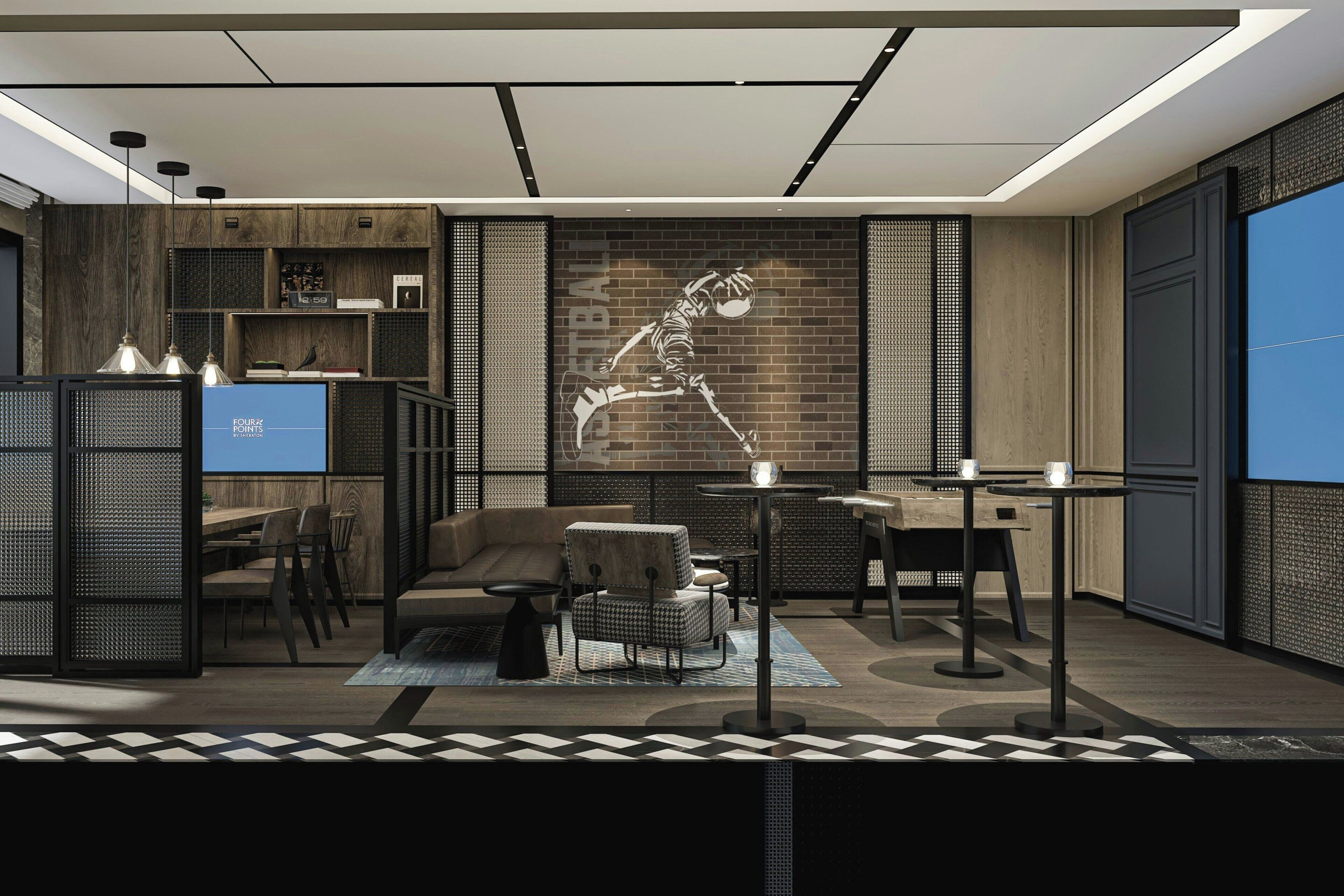 A modern interior with a sectional sofa, a coffee table, and a dining area with a small table and chairs.