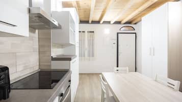 Fridge, oven, electric kettle, cookware/dishes/utensils