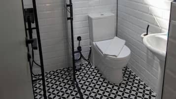 Suite | Bathroom | Bathtub, hair dryer, towels, soap