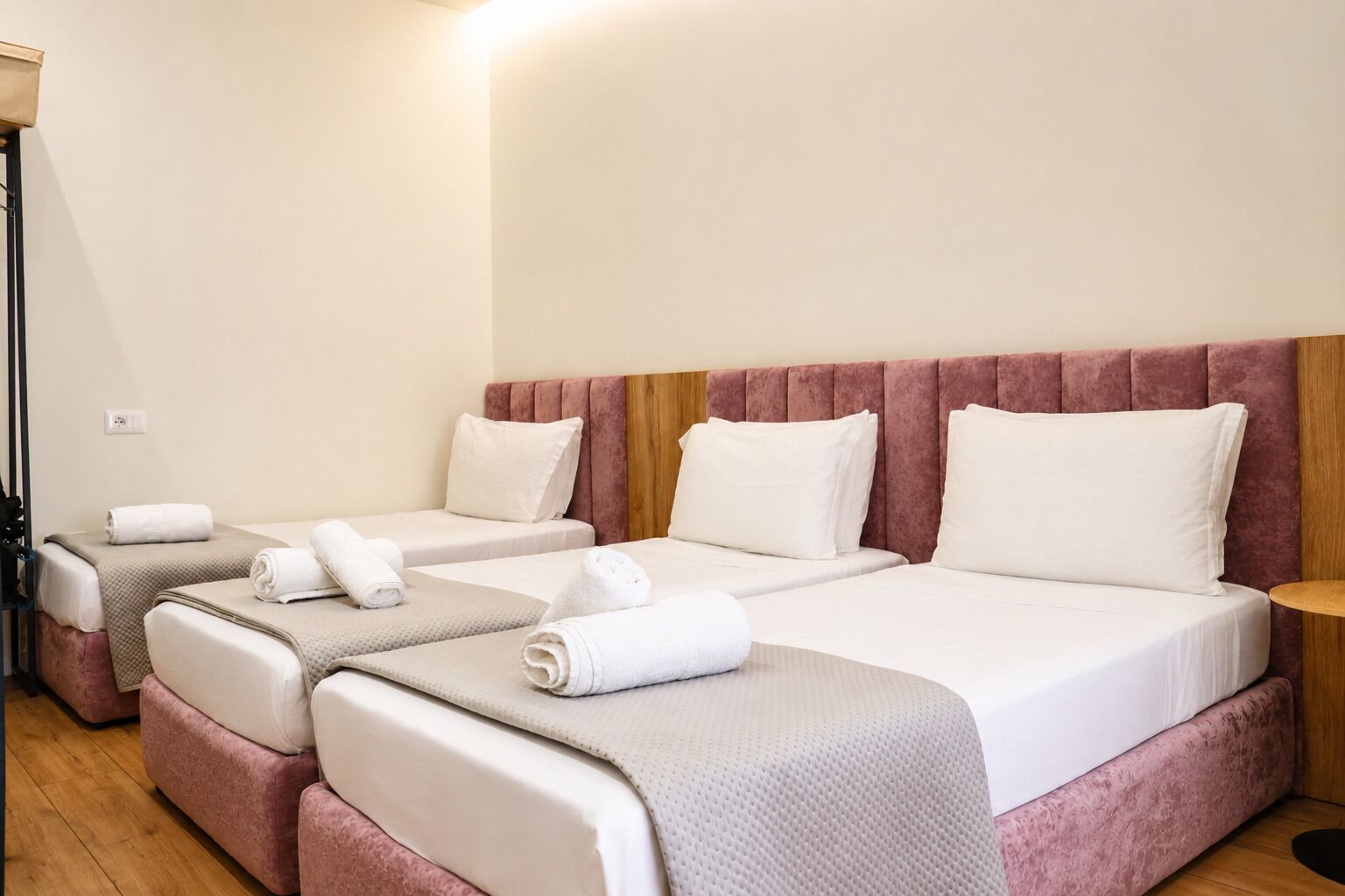 Deluxe Triple Room, Courtyard View | Desk, laptop workspace, free WiFi, bed sheets