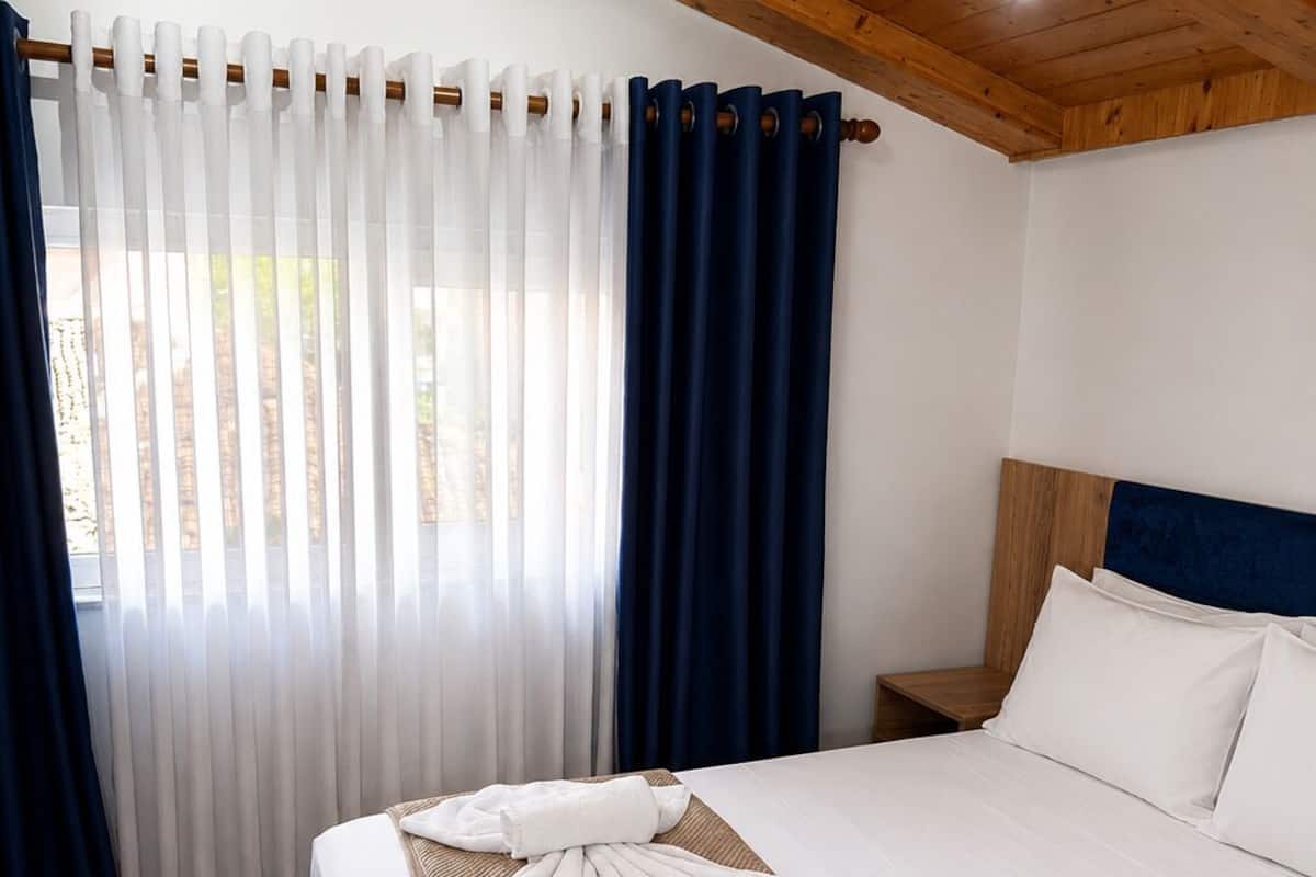Standard Double Room, Courtyard View | Desk, laptop workspace, WiFi (free), bed sheets