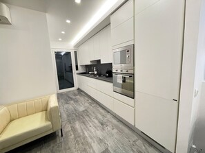 Private kitchen - Elegant 2-Bedroom, 2-Bathroom Apartment | AC | Metro Line C (Roma)
