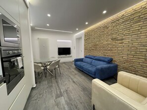Living area - Elegant 2-Bedroom, 2-Bathroom Apartment | AC | Metro Line C (Roma)