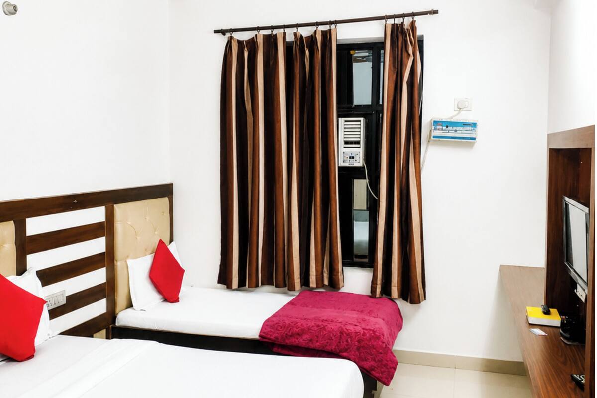 Deluxe Triple Room, Air conditioning | View from room