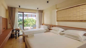 Family Triple Room, City View | In-room safe, desk, iron/ironing board (on request), WiFi (free)
