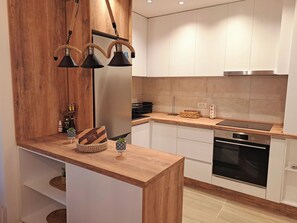 Fridge, oven, stovetop, toaster - Cozy 1-bedroom apartment in Skopje , North Macedonia (Skopje)