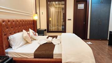 In-room safe, desk, laptop workspace, blackout curtains