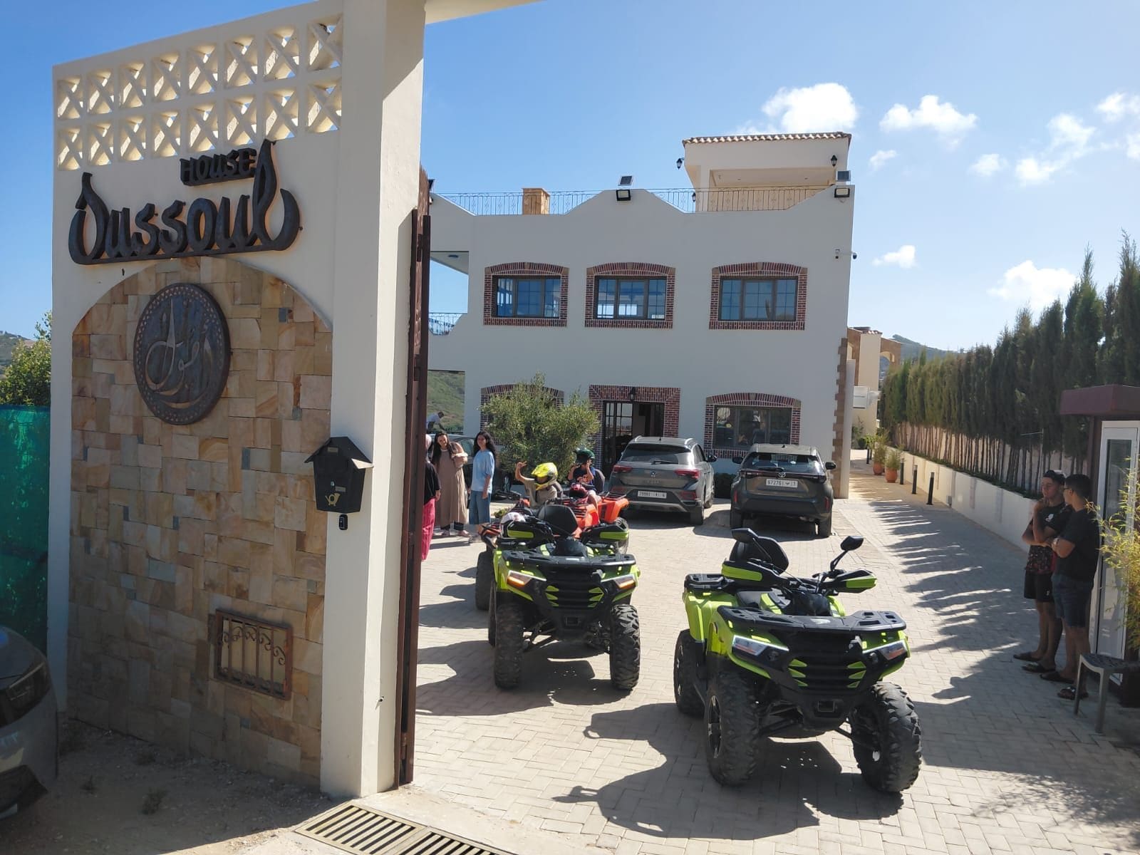 A gated entrance to a property with a sign reading 'House Dussoul'.
