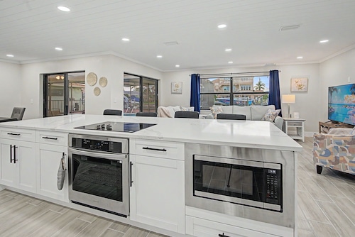 Canal Front Retreat | Private Pool, Dock, and Game Room