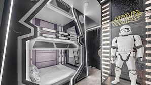 A Star Wars themed room with a bunk bed, a Star Wars poster, and a Stormtrooper figure. - 9BR villa sleeps 22 with pool table in kissimmee (Kissimmee)