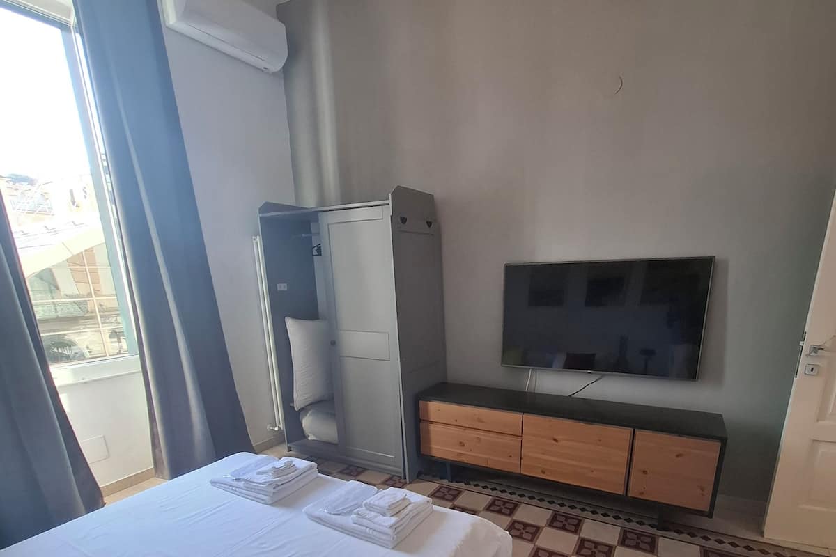 Family Condo, City View | Minibar, blackout drapes, soundproofing, iron/ironing board