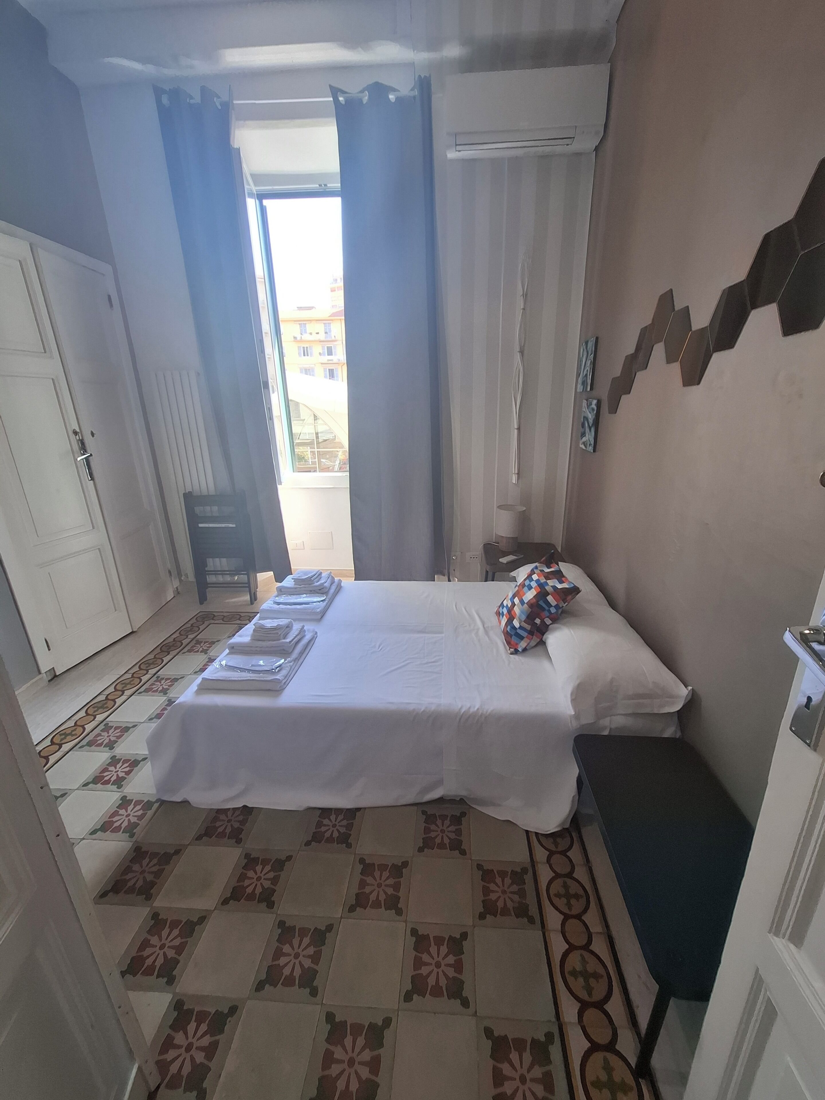 Blackout drapes, soundproofing, iron/ironing board, free WiFi