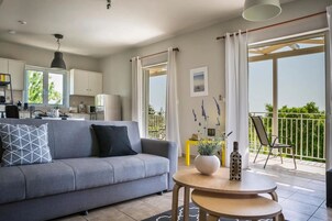 Vila luxo, sacada, vista para o oceano | Área de estar