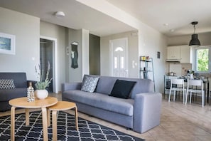 Deluxe-Villa, Balkon, Meerblick | Wohnbereich