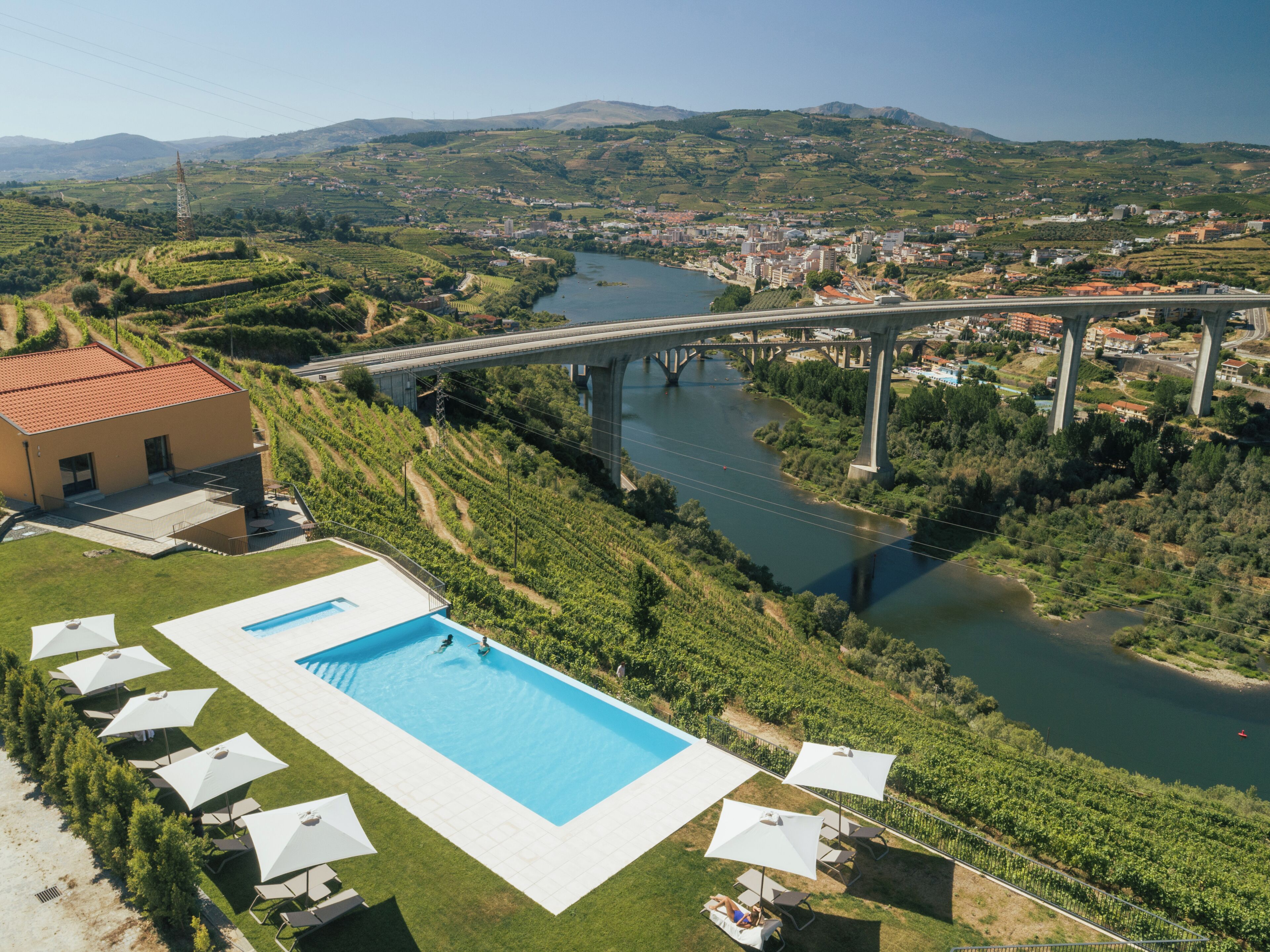 Seasonal outdoor pool, pool umbrellas, pool loungers