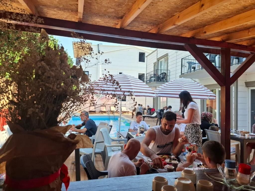 Standard-Apartment, Balkon, Gartenblick | Speisen im Freien