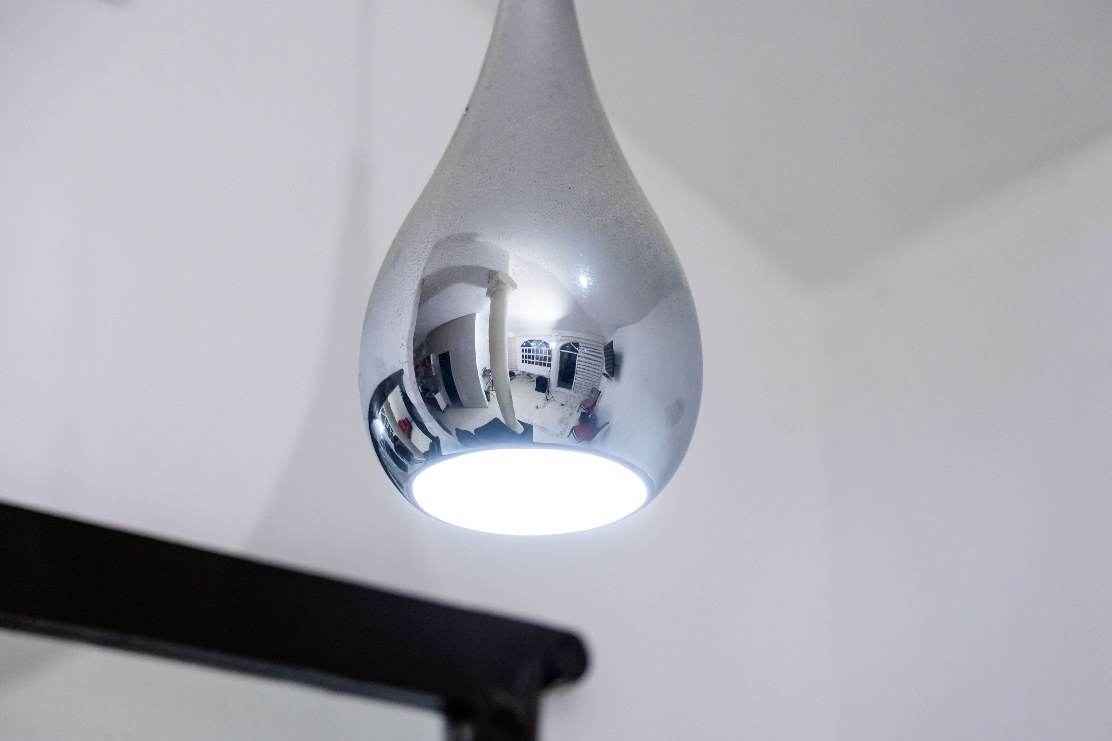 A ceiling light fixture with a reflective surface.