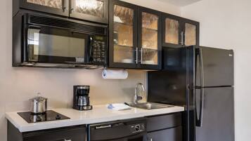 Coffee/tea maker, fridge, microwave, paper towels