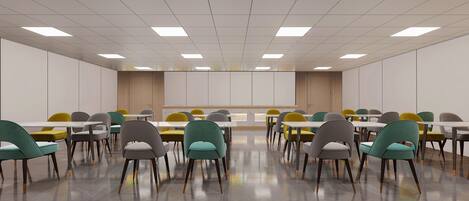 A conference room with tables and chairs, a whiteboard, and a wooden panel wall.