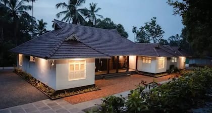 Kerala style heritage pool villa on western ghats.