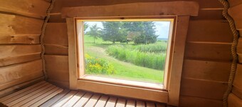 A relaxing countryside getaway with a sauna, hot tub, fireplace, and garden