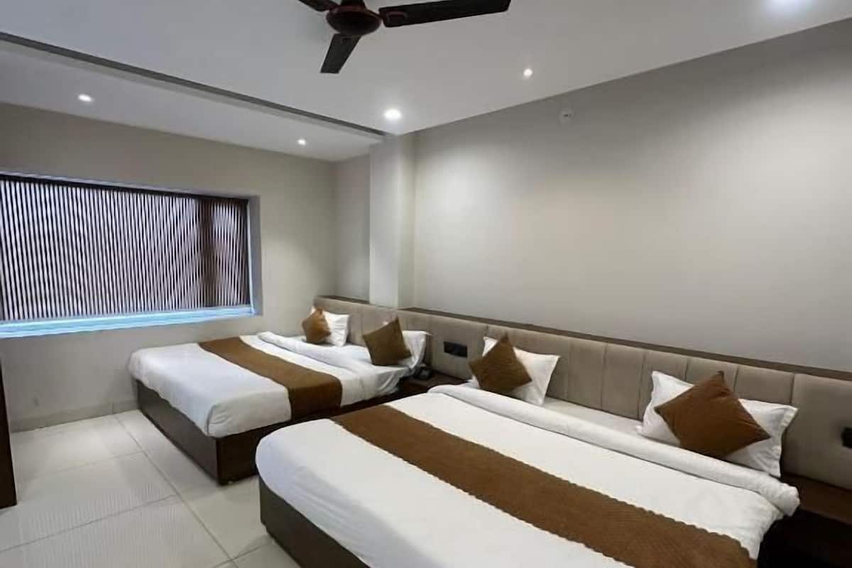 Quarto quádruplo, vista para a cidade | Wi-Fi de cortesia