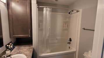 Hair dryer, towels, soap, shampoo