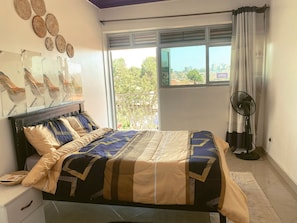 Iron/ironing board, Internet, bed sheets - Quaint 1-bedroom duplex  apartment in cool Kampala neighborhood (Kampala)